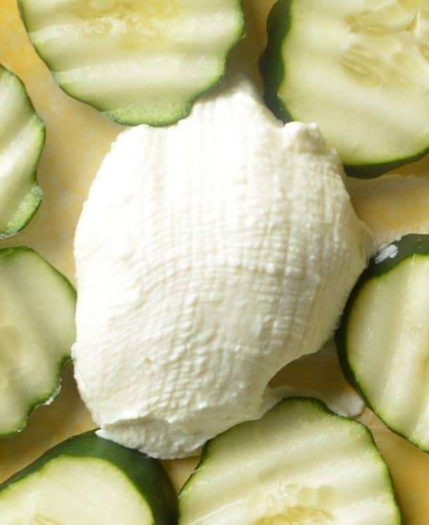 Cucumber flowers with pepper yogurt cheese spread. Strained yogurt makes a high protein dip, perfect for veggies like cucumbers!